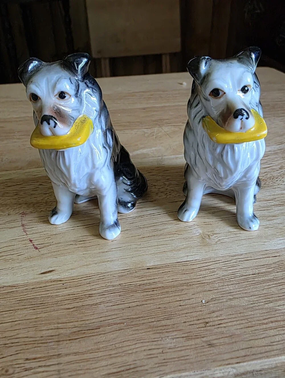 Ceramic Dog Figurine Set in White and Black with Yellow Accessory